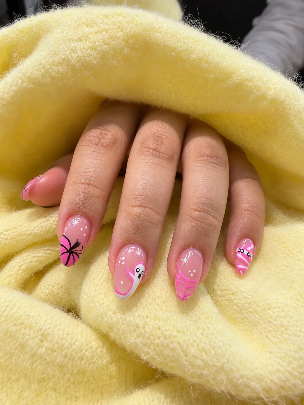 Pink nail art on hands
